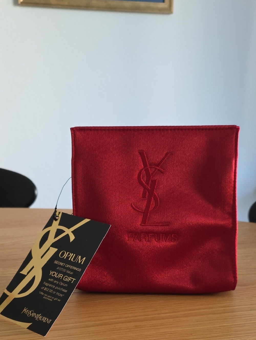 Yves Saint Laurent Parfums red satin cosmetic bag